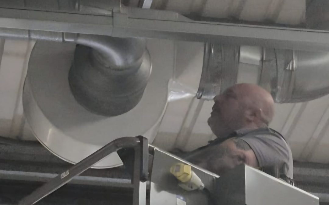 engineer conducting industry fan maintenance